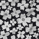 Black and white monochrome daisy print fabric, perfect for versatile fashion and home decor